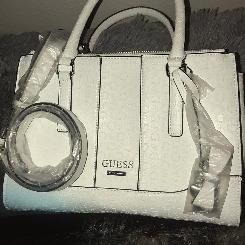 guess purse (whiling to negotiate)